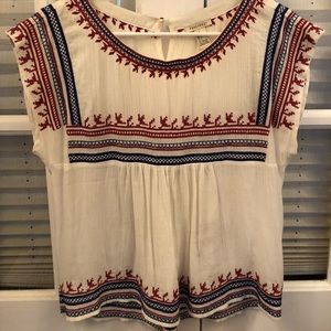 White, red, and blue top